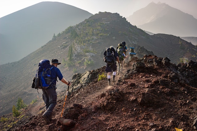 group climbing a mountain